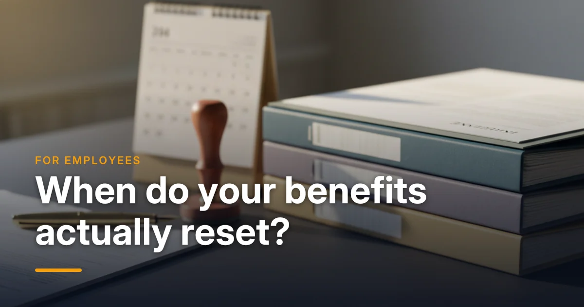 A desk calendar and a benefits card on a desk — benefit year versus calendar year and when coverage resets