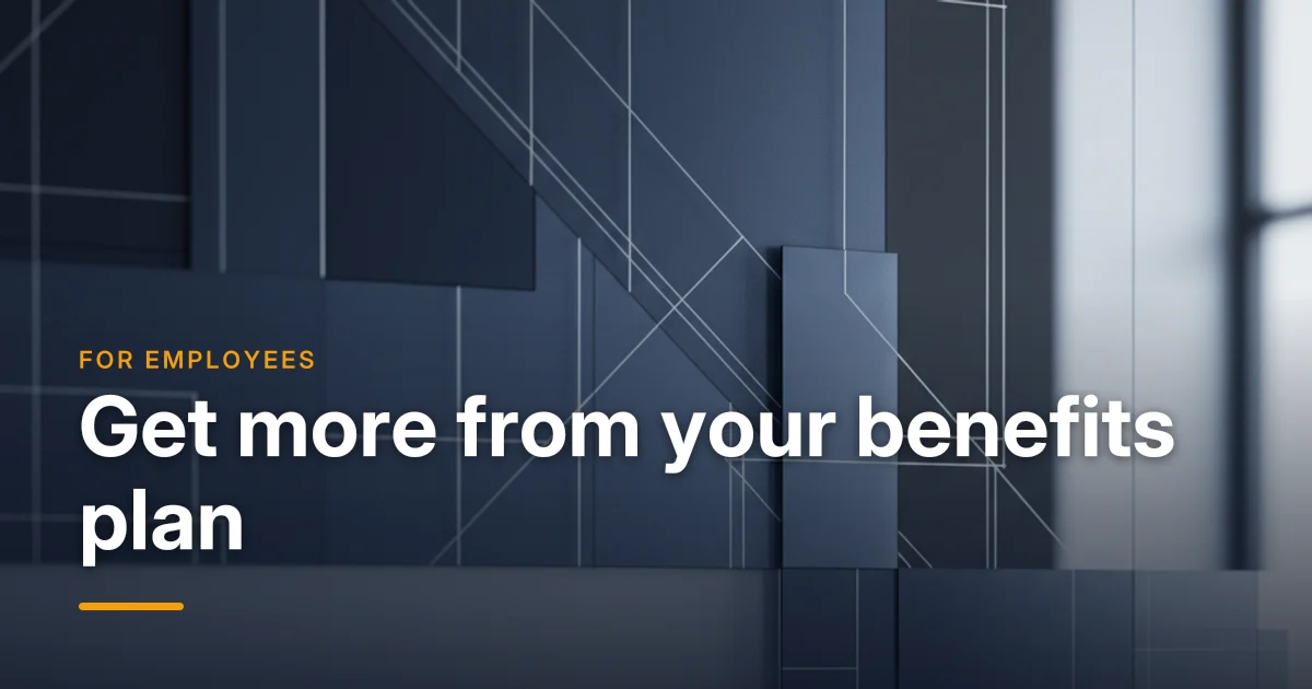 A benefits card, laptop and notebook on a desk — an employee guide to getting more from a group benefits plan